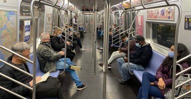 Commuters ride the subway, New York City, Nov. 5, 2020. (AFP Photo)