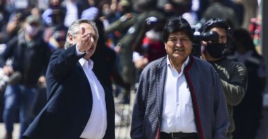 Bolivia's former president Evo Morales (R) is accompanied by Argentine President Alberto Fernandez as he arrives back in his country from Argentina, Villazon, Nov. 9, 2020. (AFP Photo)