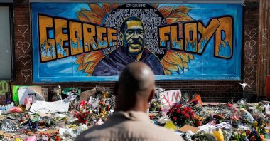 A local resident stands in front of a makeshift memorial honoring George Floyd, at the spot where he was taken into custody, in Minneapolis, Minnesota, U.S., June 1, 2020. (Reuters Photo)