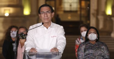 Peru's President Martin Vizcarra speaks in front of the presidential palace after lawmakers voted to remove him from office in Lima, Peru, Nov. 9, 2020. (AP Photo)