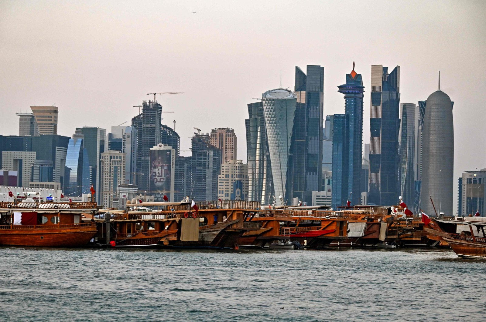 This file photo taken on Dec. 20, 2019, shows a view of boats moored in front of high-rise buildings in the Qatari capital, Doha. (AFP Photo)