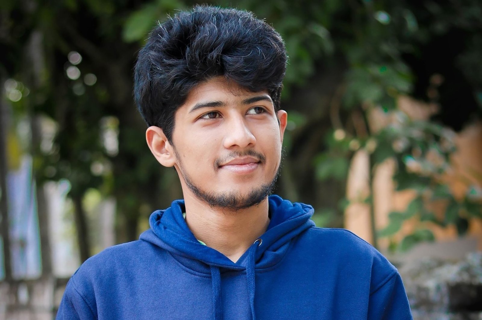 Sadat Bangladeshi Rahman, 17, one of the finalists in the prestigious 2020 KidsRights peace prize Awards for creating an online application to protect children from cybercrime and cyberbullying following the suicide of a 15-year-old girl in Bangladesh, poses for a photograph, Oct. 21, 2020. (AFP Photo)