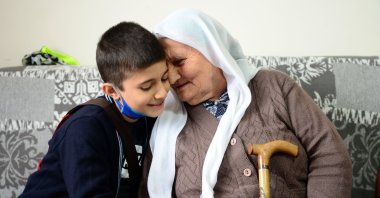 Members of the Aydın family embrace as they answer questions during an interview, Bitlis, Turkey, Nov. 13, 2020. (AA Photo)