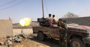 Members of the Libyan internationally recognized government forces fire during a fight with Eastern forces, in southern Tripoli, Libya June 22, 2019. (REUTERS Photo)