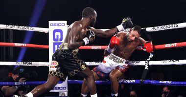 Terence Crawford and Kell Brook exchange punches during their World Boxing Organization welterweight bout in Las Vegas, U.S., Nov. 14, 2020. (Getty Images)