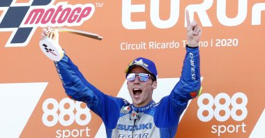 Suzuki rider Joan Mir celebrates with the trophy after winning the race MotoGP Valencia Grand Prix, in Valencia, Spain, Nov. 8, 2020. (Reuters Photo)