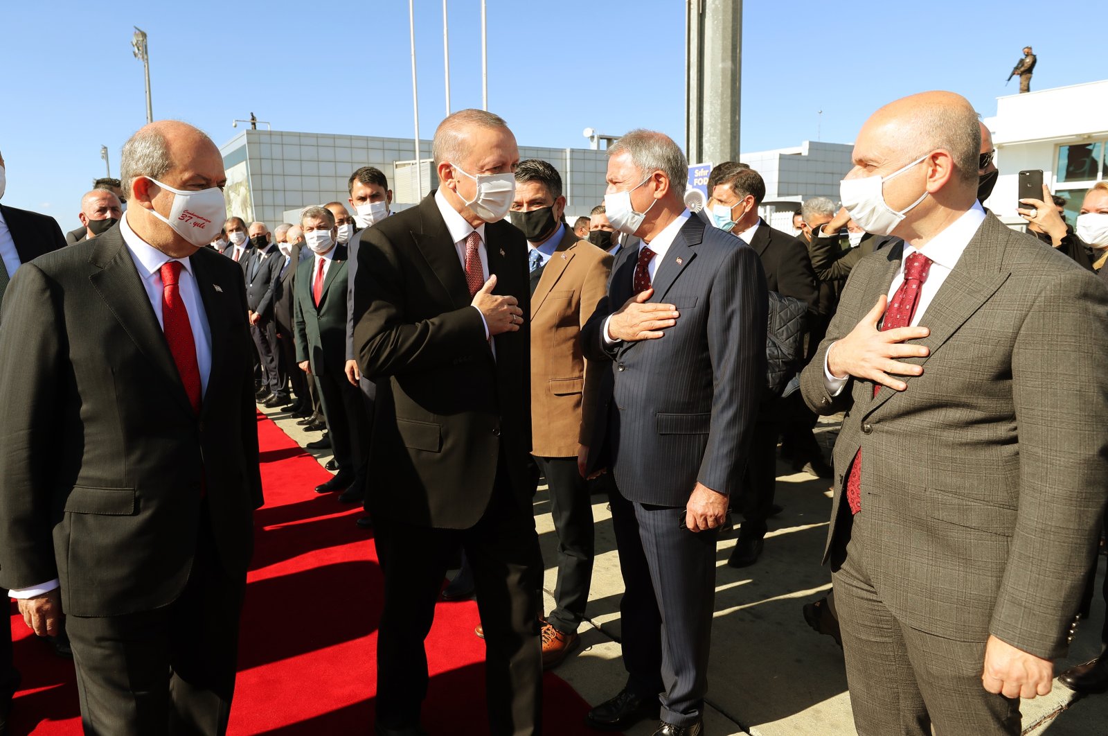 President Recep Tayyip Erdoğan (C) was welcomed by the Turkish Cypriot President Ersin Tatar (L) with an official ceremony in the capital Lefkoşa (Nicosia), the Turkish Republic of Northern Cyprus (TRNC), Nov. 15, 2020. (AA Photo)