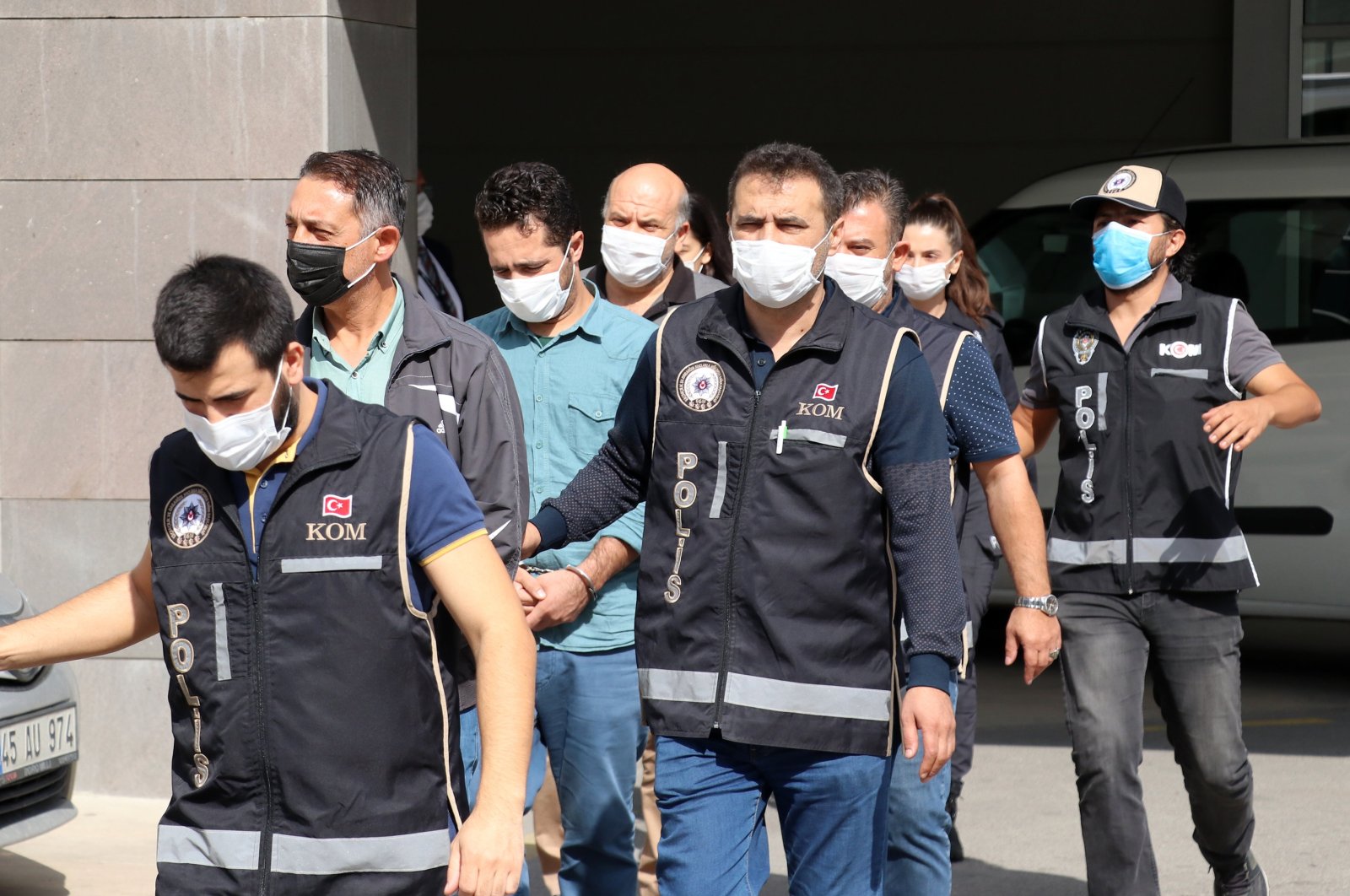 Police escort FETÖ suspects captured in Manisa, western Turkey, Oct. 15, 2020. (AA Photo)