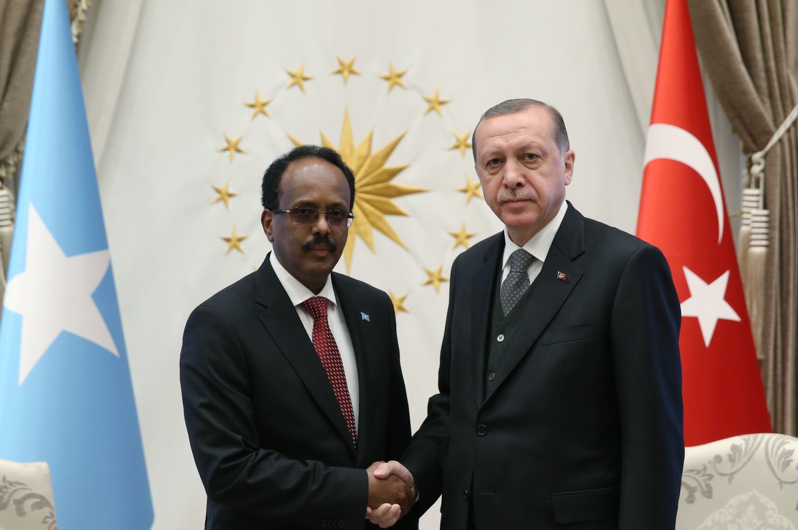 President Recep Tayyip Erdoğan shakes hands with his Somali counterpart Mohamed Abdullahi Farmaajo in Ankara, Turkey, April 26, 2017. (Photo by Ali Ekeyılmaz)