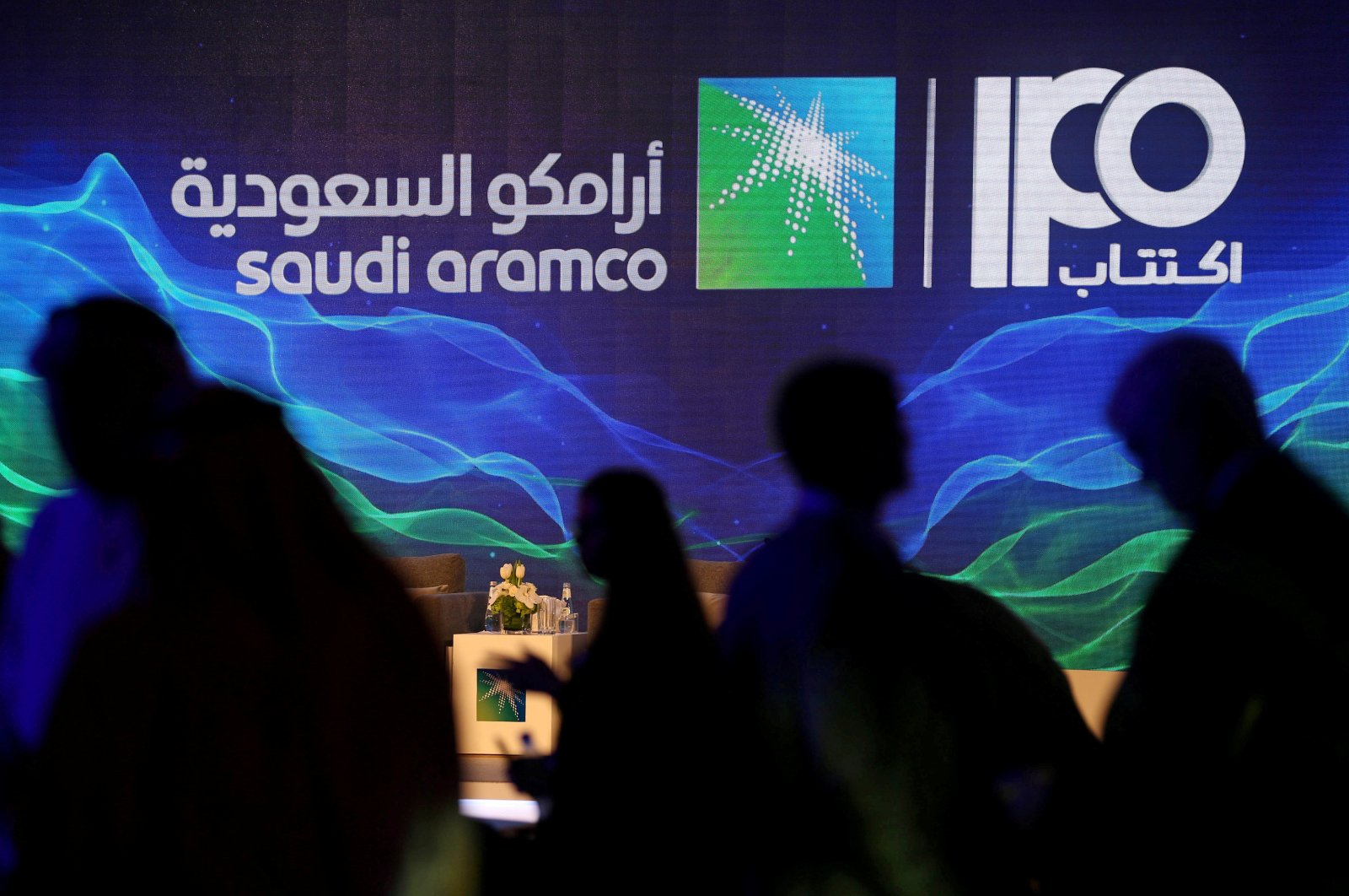 A sign of Saudi Aramco's initial public offering (IPO) is seen during a news conference by the state oil company at the Plaza Conference Center in Dhahran, Saudi Arabia, Nov. 3, 2019. (Reuters Photo)
