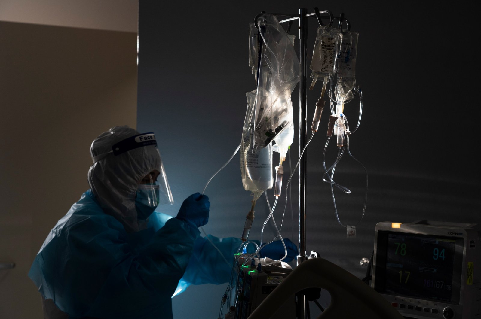 A medical staff member treats a patient suffering from the coronavirus disease in the COVID-19 intensive care unit (ICU) at the United Memorial Medical Center, Houston, Texas, Nov. 14, 2020. (Getty Images)