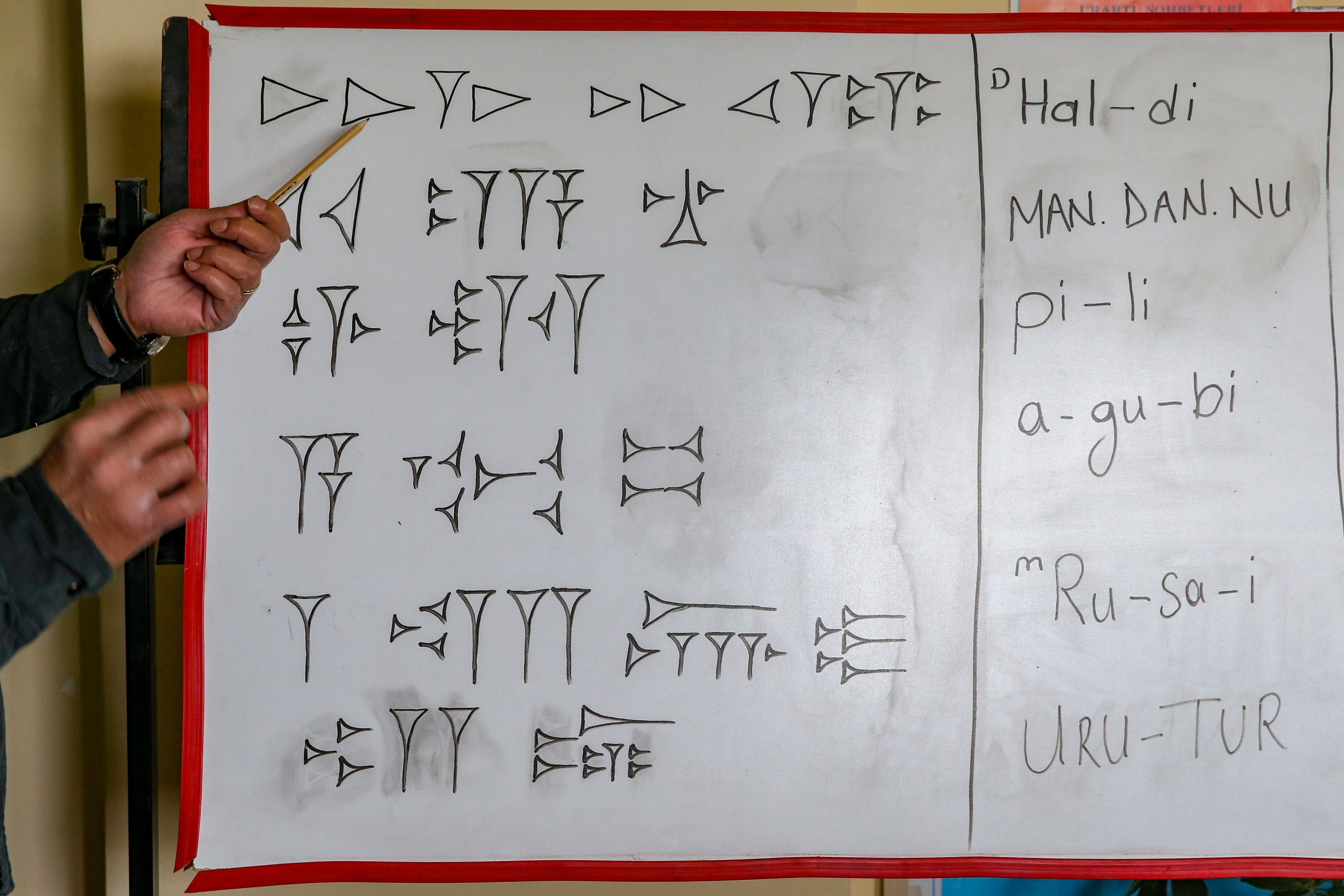 Some Urartian ideograms are seen on a board at an Urartian class at Yüzüncü Yıl University, Van, eastern Turkey, Nov. 16, 2020. (AA Photo)