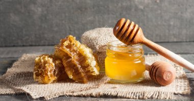 Honey may be better than prescription antibiotics for coughs in children, a new study has found. (Shutterstock Photo)