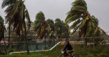 A man rides his bicycle in Bilwi, Puerto Cabezas, Nicaragua on Nov. 16, 2020. (AFP Photo)