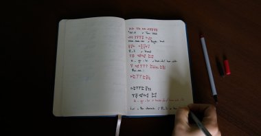 A student's Urartian notes in a notebook at Yüzüncü Yıl University, Van, eastern Turkey, Nov. 16, 2020. (AA Photo)
