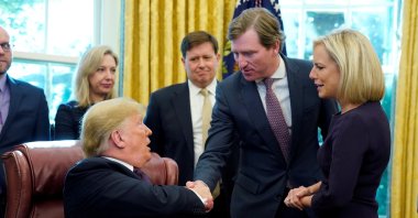 U.S. President Donald Trump shakes hands with Chris Krebs, the director of the Cybersecurity and Infrastructure Security Agency (CISA) in the Oval Office of the White House, Washington, D.C., U.S., Nov. 16, 2018. (Reuters Photo)