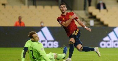Spain's Ferran Torres vies with Germany's goalkeeper Manuel Neuer during a UEFA Nations League match in Seville, Spain, Nov. 17, 2020. (AFP Photo)