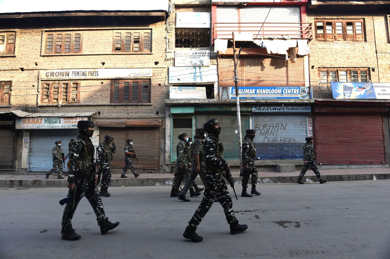 Paramilitary soldiers patrol near the site of the Batamaloo encounter, Srinagar, India, Sept. 17, 2020. (Photo by Getty Images)