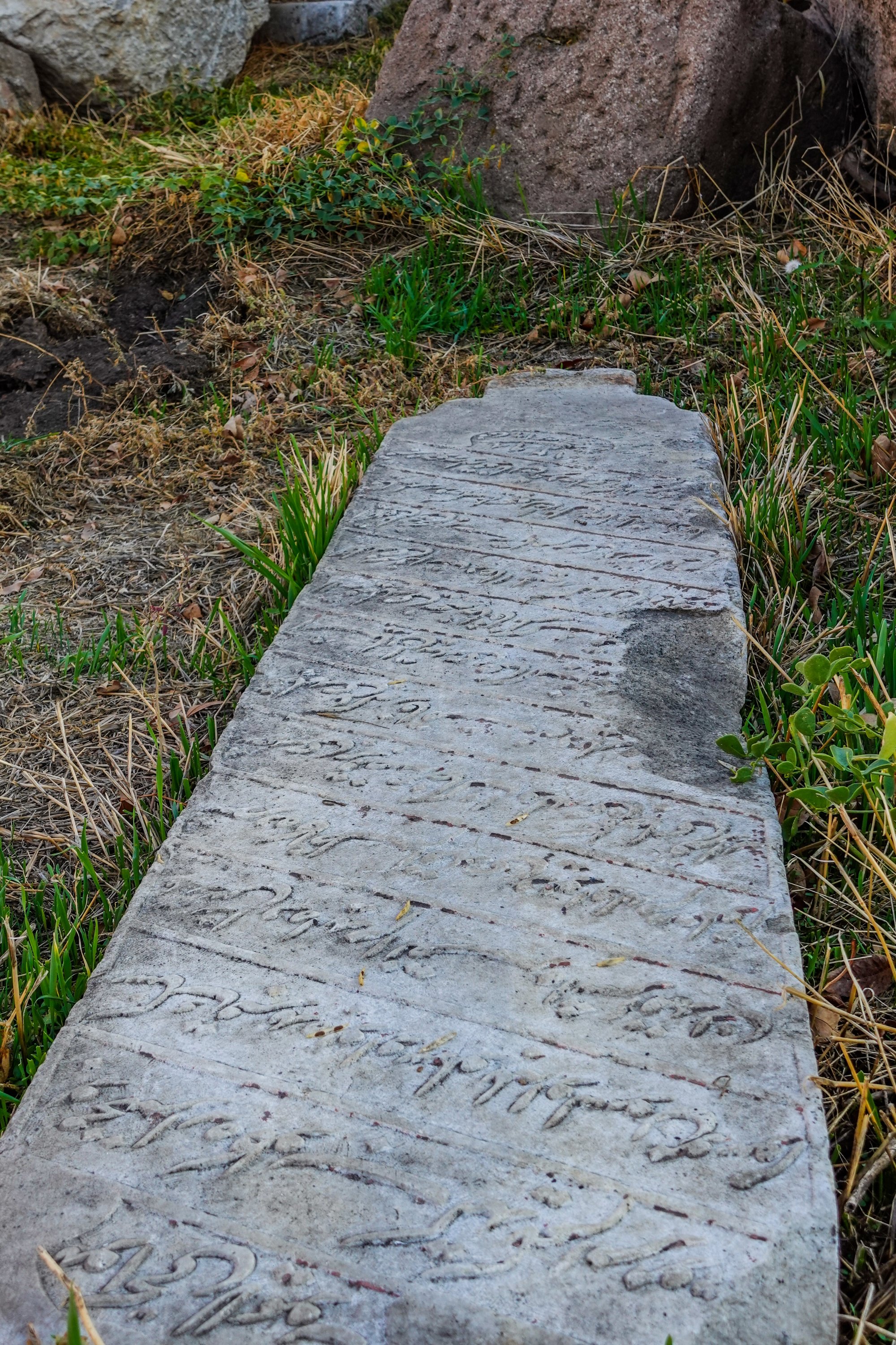 A tombstone with inscriptions in Arabic or Ottoman Turkish. (Photo by Argun Konuk)