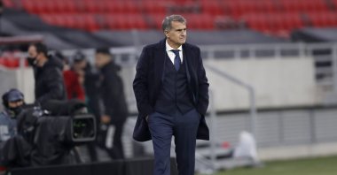 Turkey coach Şenol Güneş walks by the touchline during the UEFA Nations League match against Hungary, in Budapest, Hungary, Nov. 18, 2020. (AP Photo)