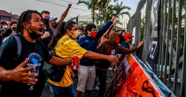 People protest against the murder of black man Joao Alberto Silveira Freitas at a Carrefour supermarket the night before, on Brazil's National Black Consciousness Day in Porto Alegre, Rio Grande do Sul, Brazil, Nov. 20, 2020. (AFP Photo)