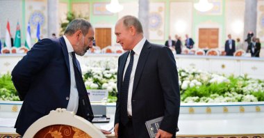 Russia's President Vladimir Putin and Armenia's Prime Minister Nikol Pashinian at a Commonwealth of Independent States (CIS) meeting at the Somon Palace, Dushanbe, Tajikistan, Sept. 28, 2018. (Photo by Getty Images)