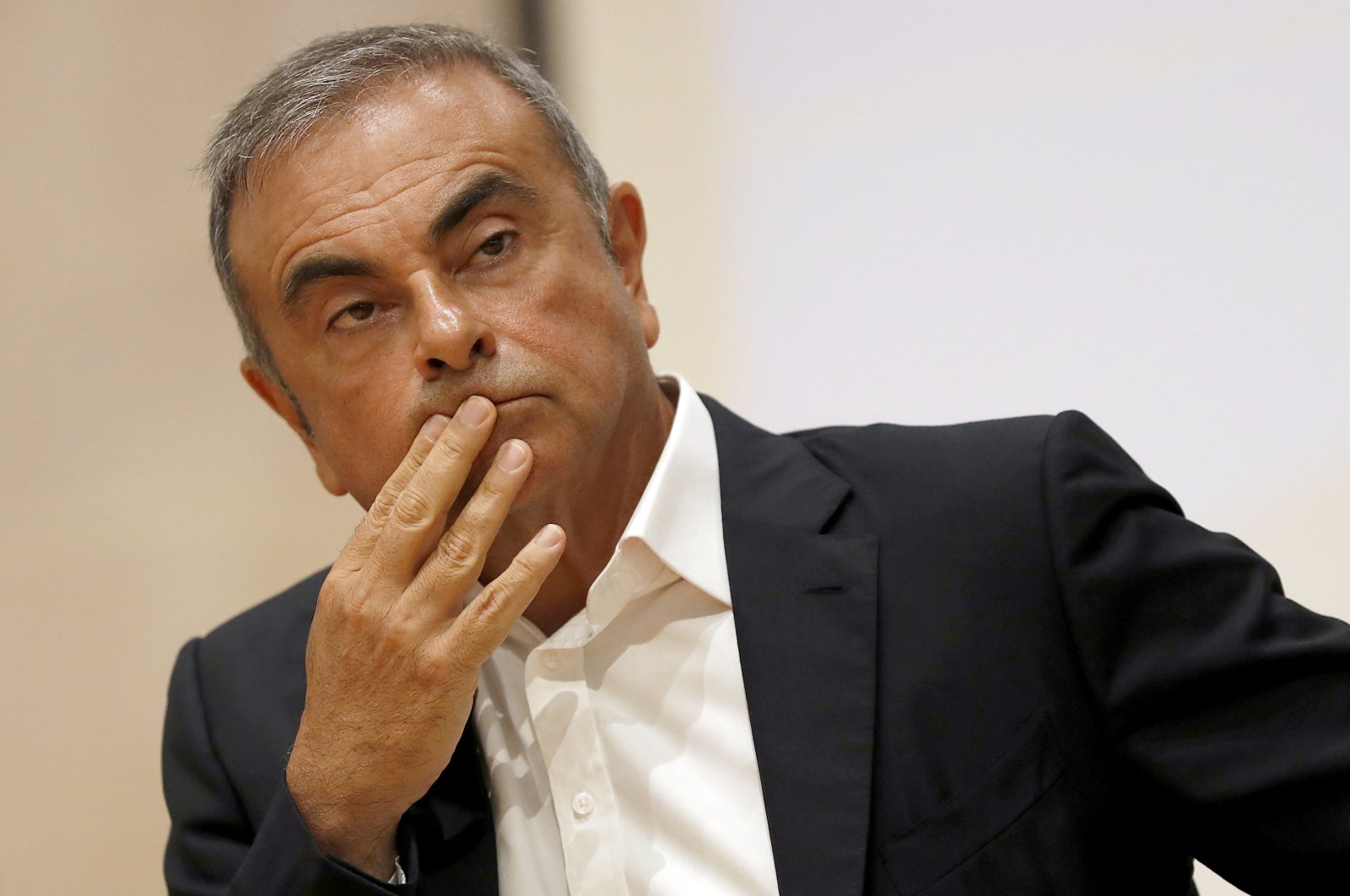 Former Nissan Motor Co. Chairman Carlos Ghosn holds a press conference at the Maronite Christian Holy Spirit University of Kaslik, north of Beirut, Lebanon, Sept. 29, 2020. (AP Photo)