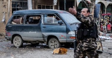 Afghan security personnel arrive at a site after two blasts ripped through in the city of Bamiyan on Nov. 24, 2020. (AFP Photo)