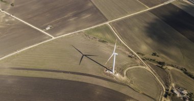 A wind tribune stands in the middle of farmlands in the countryside of Istanbul, Turkey, Oct. 22, 2020. (EPA Photo)