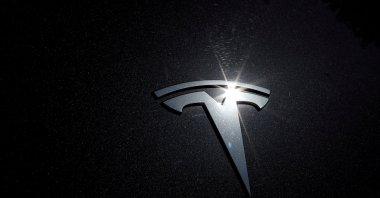 The Tesla logo is seen on a car in Los Angeles, California, U.S. on July 9, 2020. (Reuters Photo)