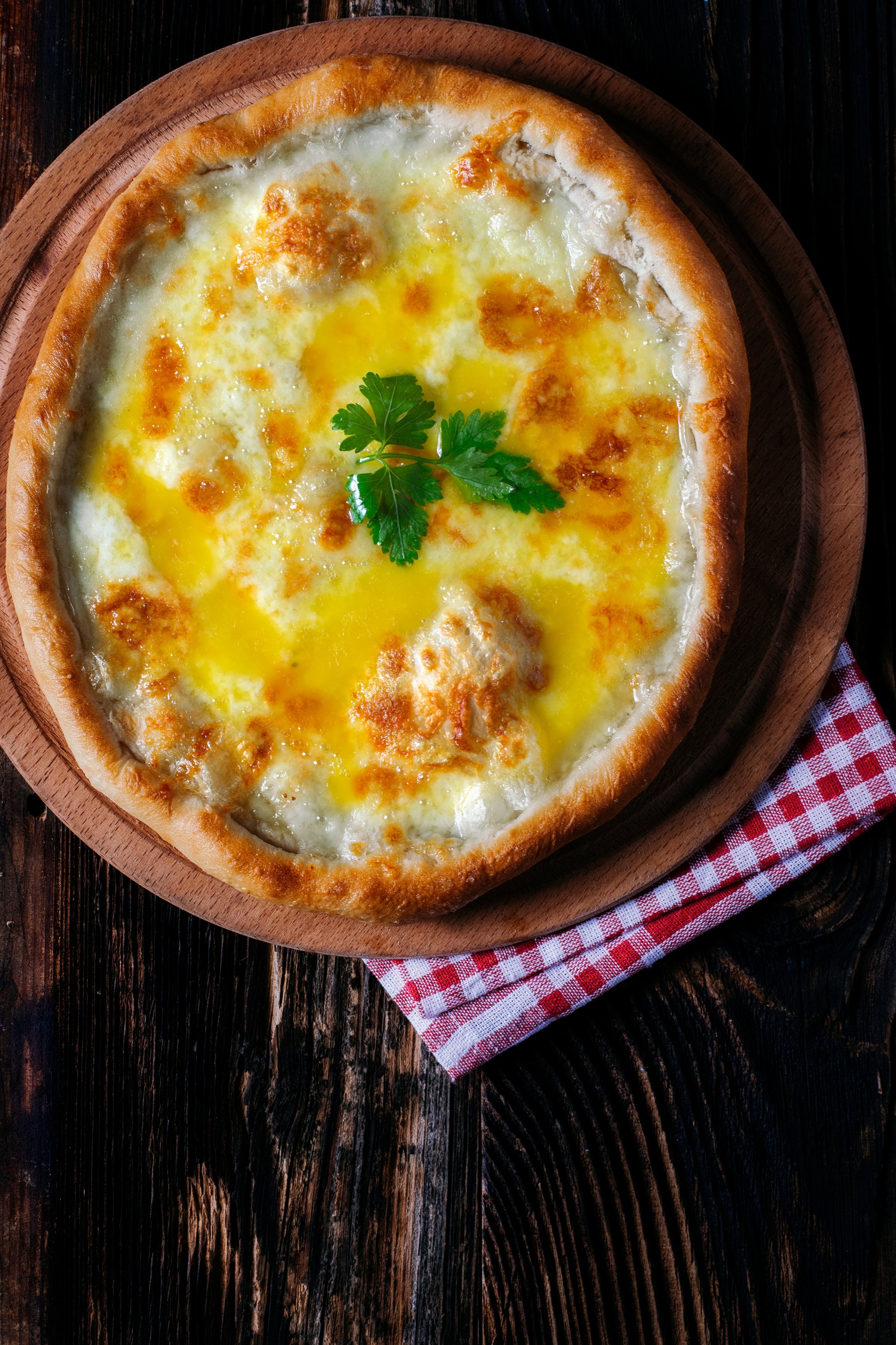 Trabzon pidesi incorporates a lot of butter, cheese and a few eggs. (Shutterstock Photo)