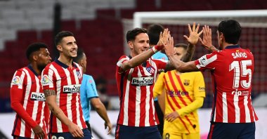 Atletico Madrid players celebrate winning a La Liga match against Barcelona, in Madrid, Spain, Nov. 21, 2020. (AFP Photo)