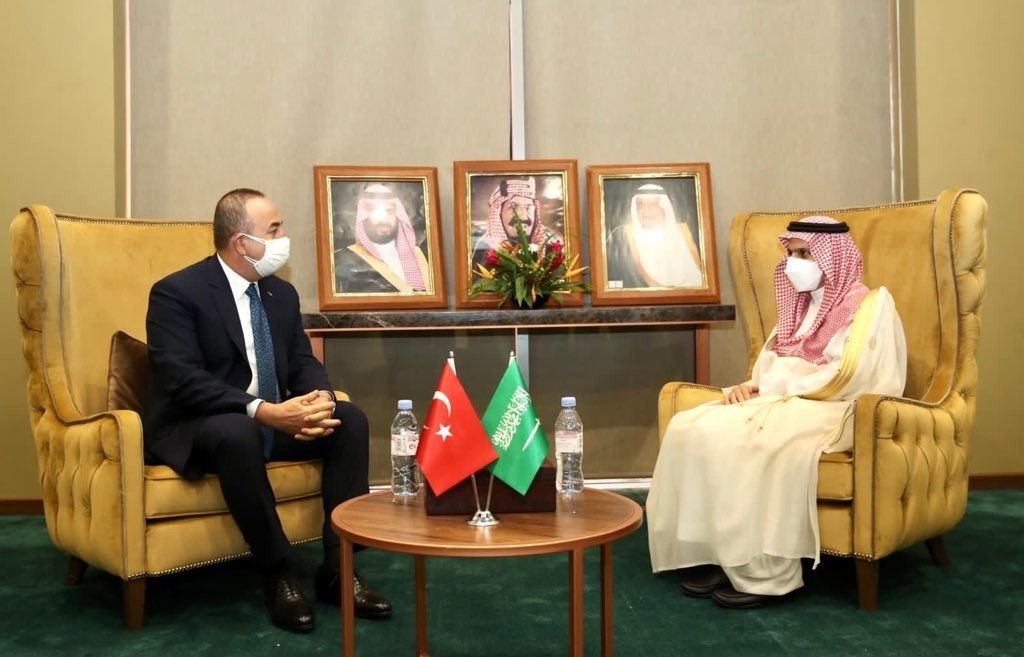 Foreign Minister Çavuşoğlu (L) and his Saudi counterpart Farhan bin Abdullah Al Saud meet on the sidelines of the Organization of Islamic Cooperation's (OIC) Council of Foreign Ministers in Niger's Niamey, Nov. 27, 2020 (IHA Photo)