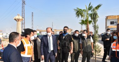The Şanlıurfa governorate's Syria Support and Coordination Center planted 600 trees in Tal Abyad and Ras al-Ain, northern Syria, Nov. 12, 2020. (AA Photo)