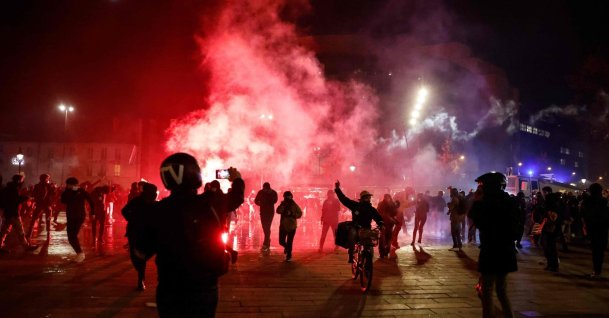 Tens of thousands protest new security law in Paris