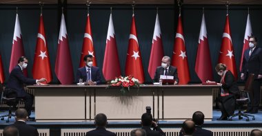 A MoU was signed by Turkey's Trade Minister Ruhsar Pekcan (R) and Qatari Trade and Industry Minister Ali Bin Ahmed Al Kuwari (L) during the meeting chaired by President Recep Tayyip Erdoğan (center R) and Qatari Emir Sheikh Tamim bin Hamad Al Thani (center L), Ankara, Turkey, Nov. 26, 2020. (AA Photo)