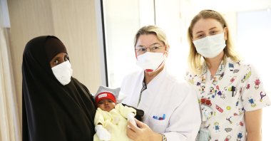Muno Dahir poses with her infant daughter at a hospital in Istanbul, Turkey, Nov. 29, 2020. (AA Photo)