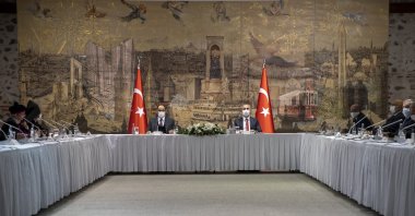 Justice Minister Abdulhamit Gül and Presidential Spokesperson Ibrahim Kalın chair a meeting with the representatives of minority communities in Turkey at the Dolmabahçe Presidential Office in Istanbul, Nov. 29, 2020. (AA Photo)