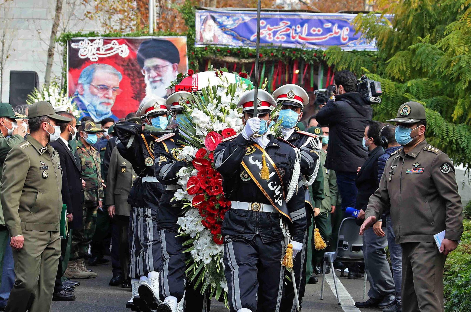 Members of Iranian forces carry the coffin of slain top nuclear scientist Mohsen Fakhrizadeh during his funeral ceremony, Tehran, Iran, Nov. 30, 2020. (AFP Photo)