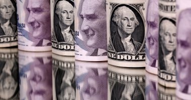 The Turkish lira and U.S. dollar banknotes are seen in this illustration taken Jan. 6, 2020. (Reuters Photo)