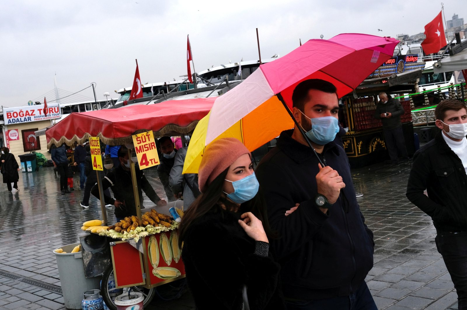 People wearing protective masks stroll in Eminönü district, amid the spread of coronavirus disease, Istanbul, Turkey, Nov. 7, 2020. (Reuters Photo)
