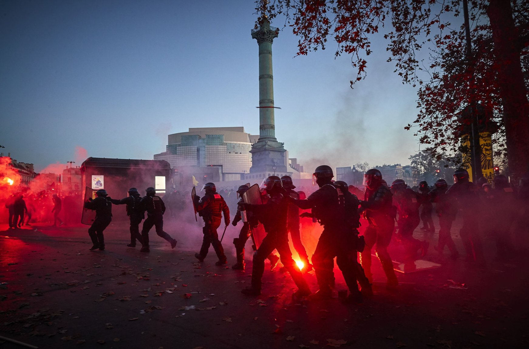 In photos: Clashes erupt at protest against police violence in Paris ...