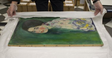 The Ricci Oddi Gallery unpacks the rediscovered "Portrait of a Lady" by Austrian art nouveau master Gustav Klimt, in Piacenza, Italy, Nov. 28, 2020. (DPA Photo)