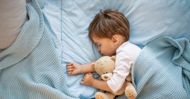 As relaxing as an afternoon nap may be for both parents and the child, at some point it's time to let it go. (Shutterstock Photo)