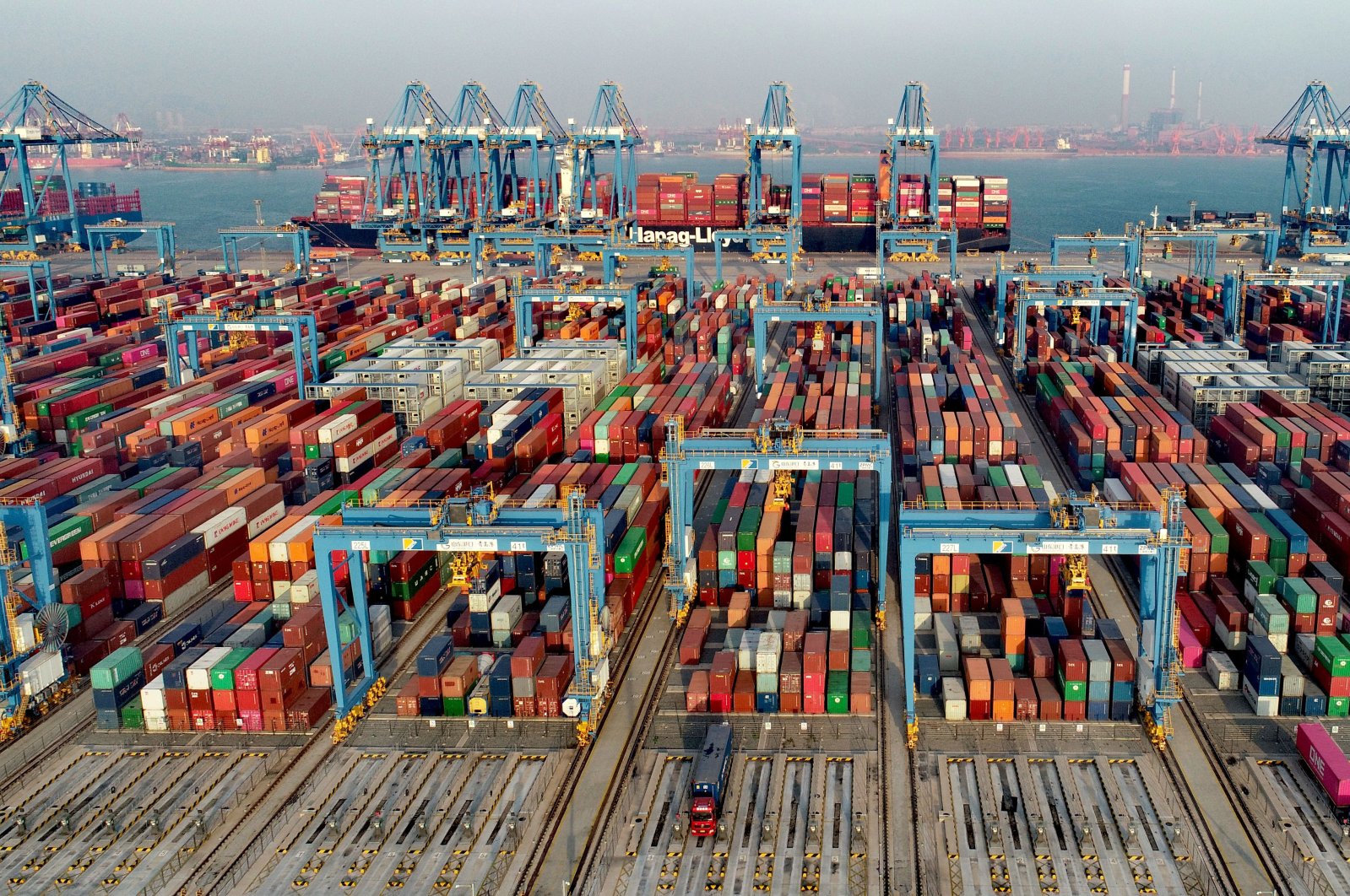 Shipping containers sit stacked at Asia's first fully automated container terminal of Qingdao Port in the Qingdao Area of China (Shandong) Pilot Free Trade Zone (FTZ) in Qingdao, Shandong province, China, Dec. 1, 2020. (Getty Images)