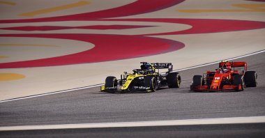 Daniel Ricciardo of Australia (L) and Charles Leclerc of Monaco in action during the Formula One Bahrain Grand Prix in Sakhir, Bahrain, Nov. 29, 2020. (AP Photo)