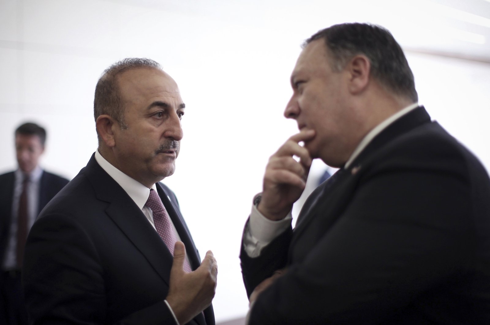 Foreign Minister Mevlüt Çavuşoğlu (L) talks with U.S. Secretary of State Mike Pompeo at Esenboğa Airport in Ankara, Turkey, Oct. 17, 2018. (AP File Photo)
