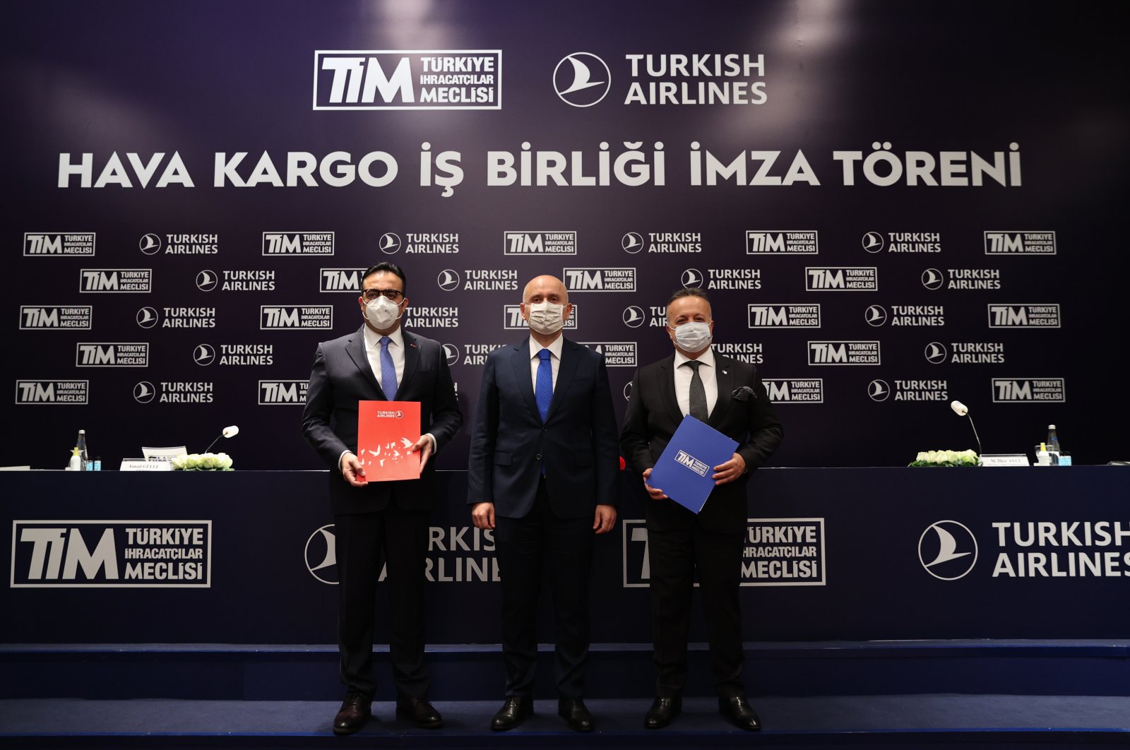 Transport and Infrastructure Minister Adil Karaismailoğlu (M), THY Chairperson Ilker Aycı (L) and TIM Chairperson Ismail Gülle (R) during the launching ceremony of the protocol, Istanbul, Turkey, Dec. 4, 2020. (AA Photo)