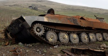 A destroyed Armenian military vehicle lays in the countryside outside the towns of Hadrut and Khojavend, Azerbaijan, Nov. 30, 2020. (AFP Photo)