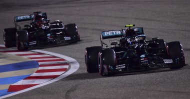Finnish Formula One driver Valtteri Bottas of Mercedes-AMG Petronas (front) and his British teammate George Russell in action during the qualifying session of the Formula One Sakhir Grand Prix at Bahrain International Circuit near Manama, Bahrain, Dec. 05, 2020 (EPA Photo)